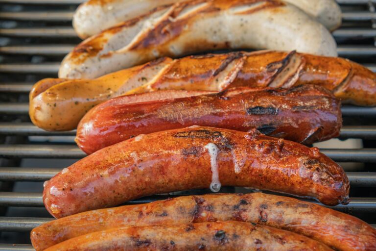 grilled sausages on a barbecue grill