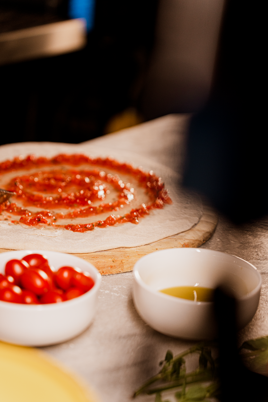 dough with tomato sauce