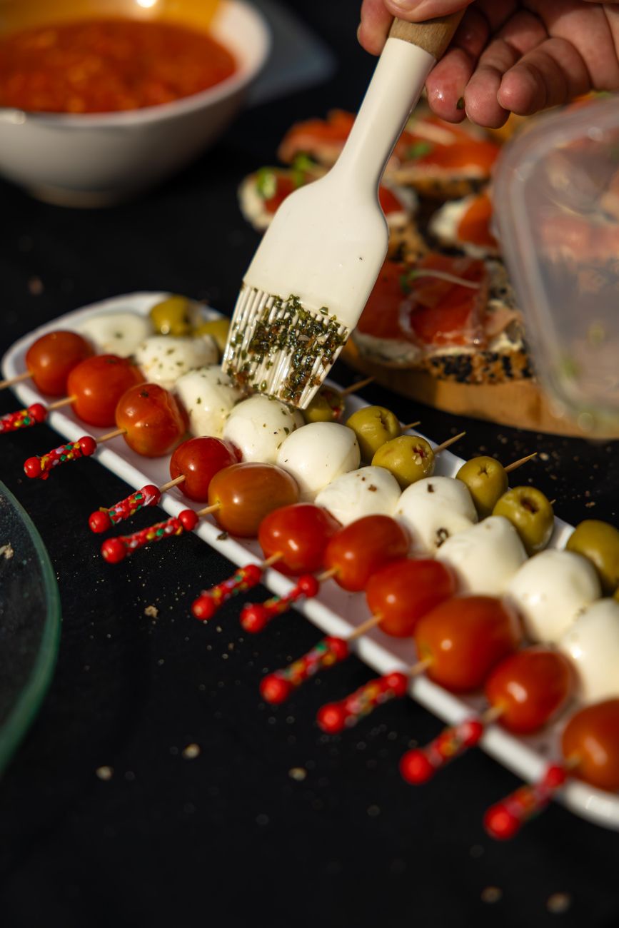 caprese skewers with cherry tomatoes and mozzarella