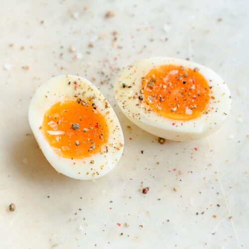 cut eggs on white background